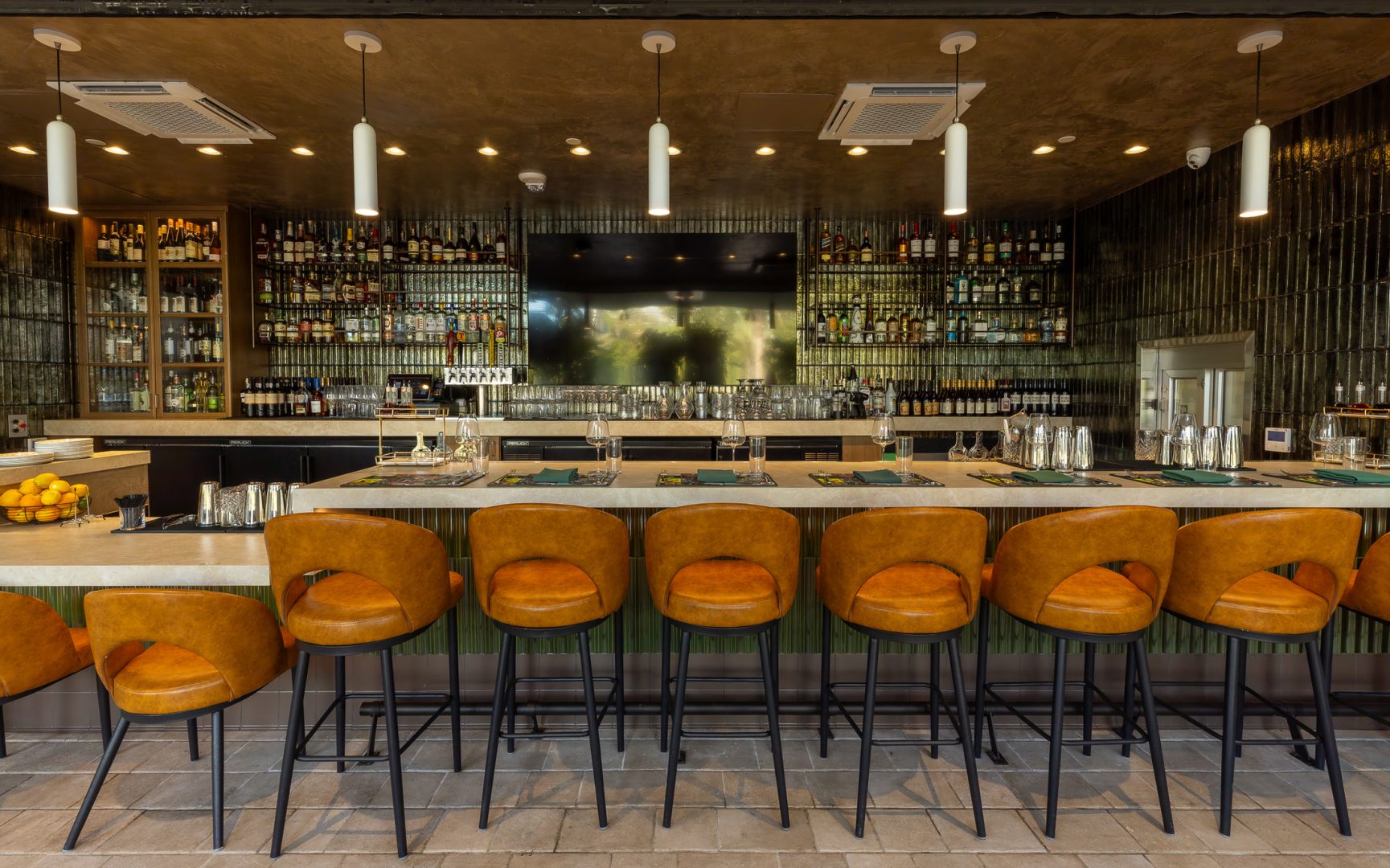 Counter seating and bottle display inside The Carnaby
