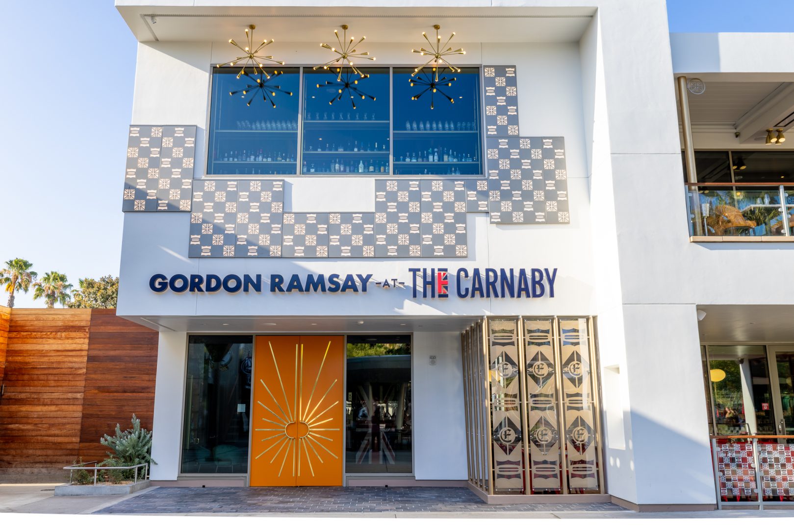White exterior of Gordon Ramsay at The Carnaby at Downtown Disney
