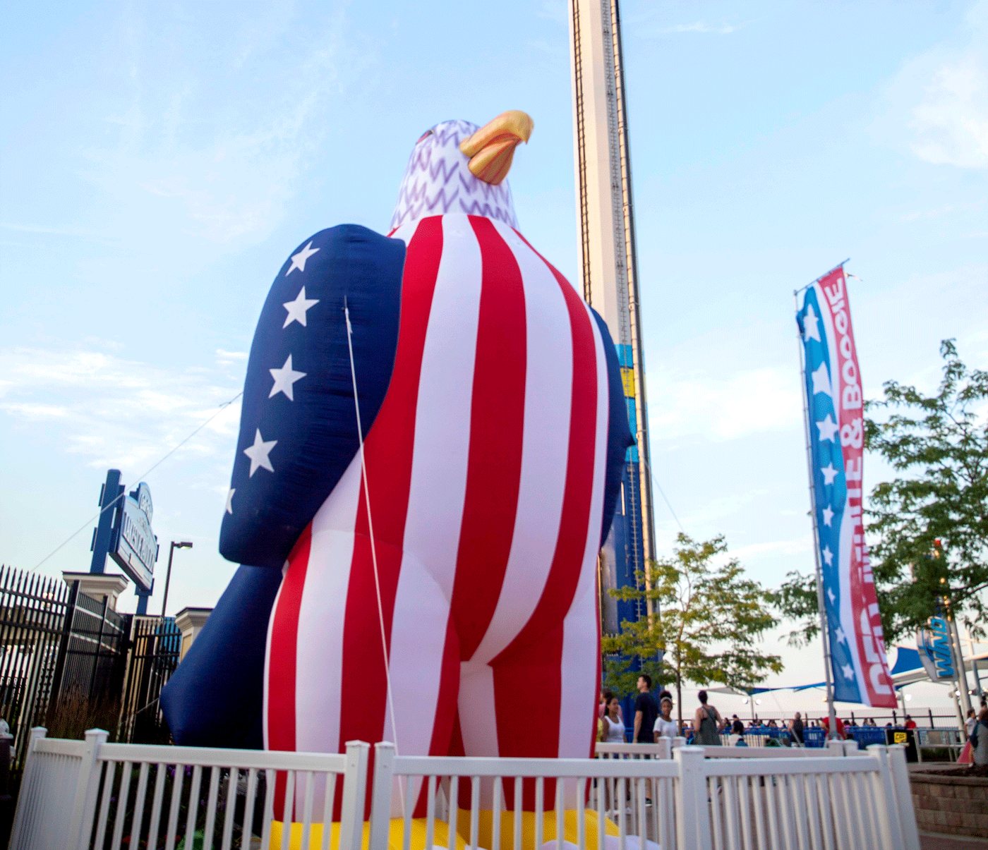Rows of American flags line a Cedar Point walkway