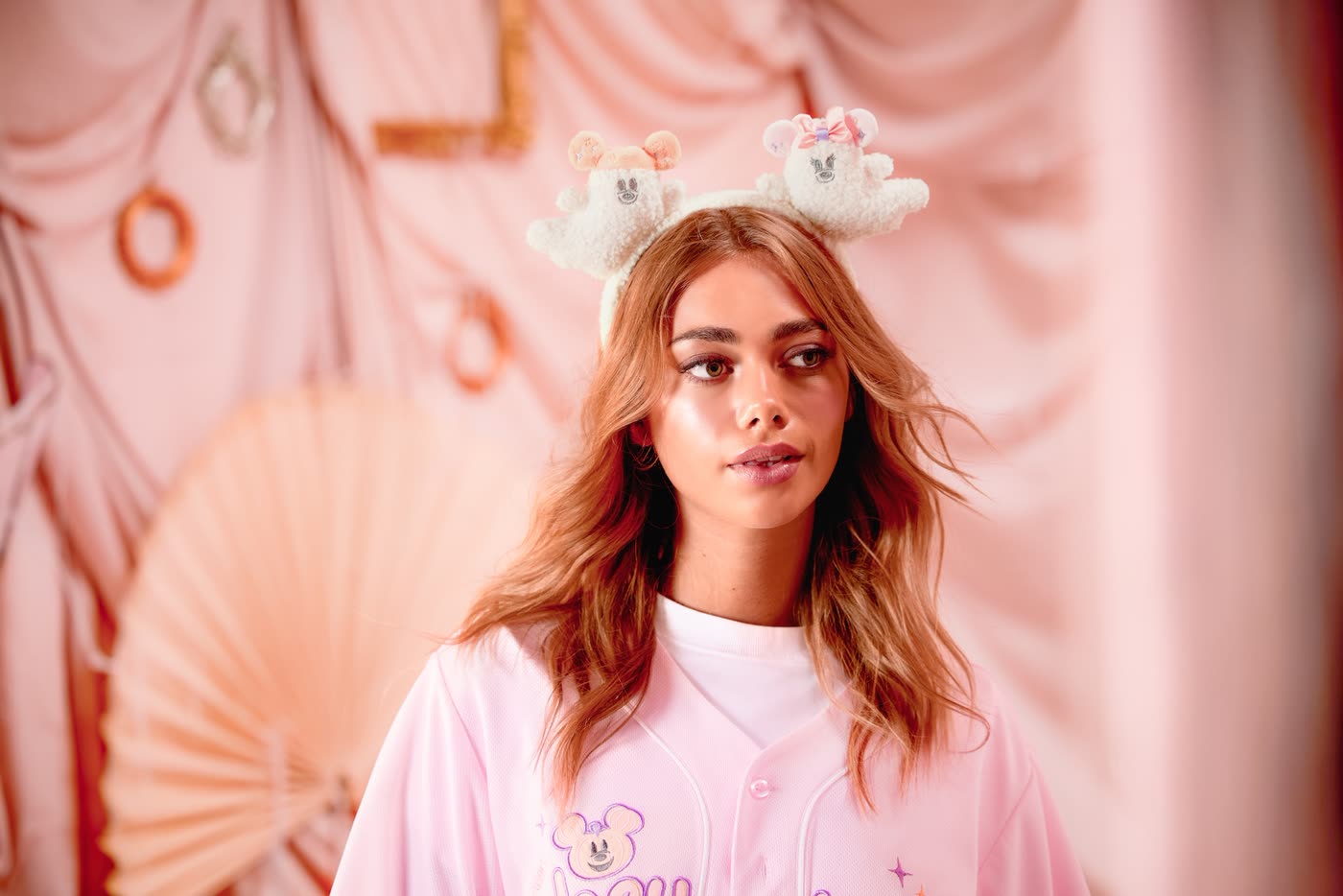 Model wearing a white Disney Cutie Ghost ear headband