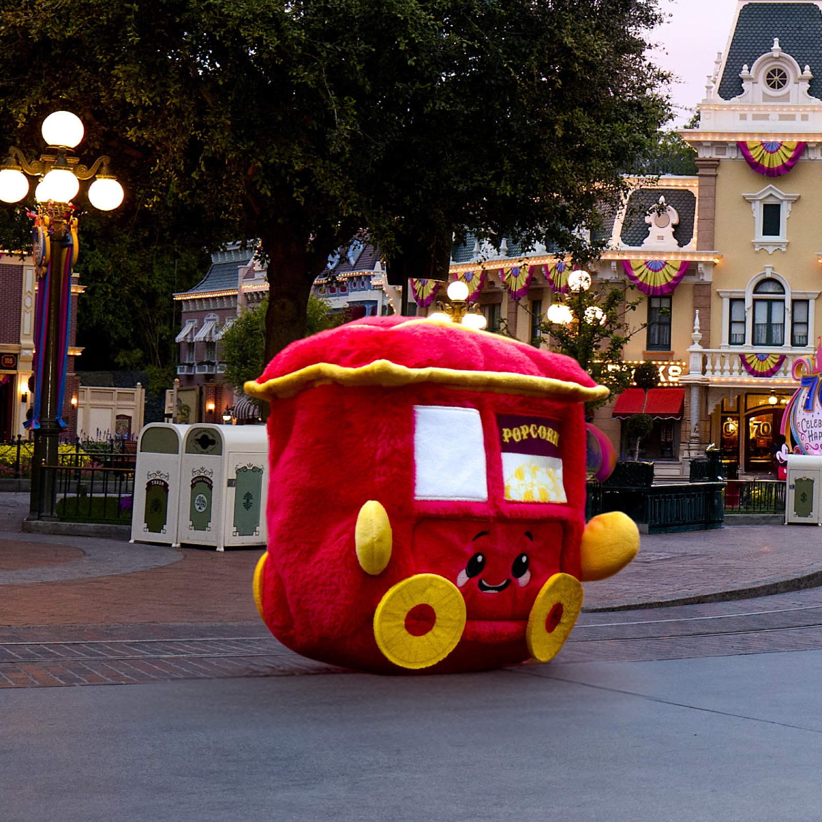 Smiling plush Disneyland popcorn cart collectible on Main Street USA