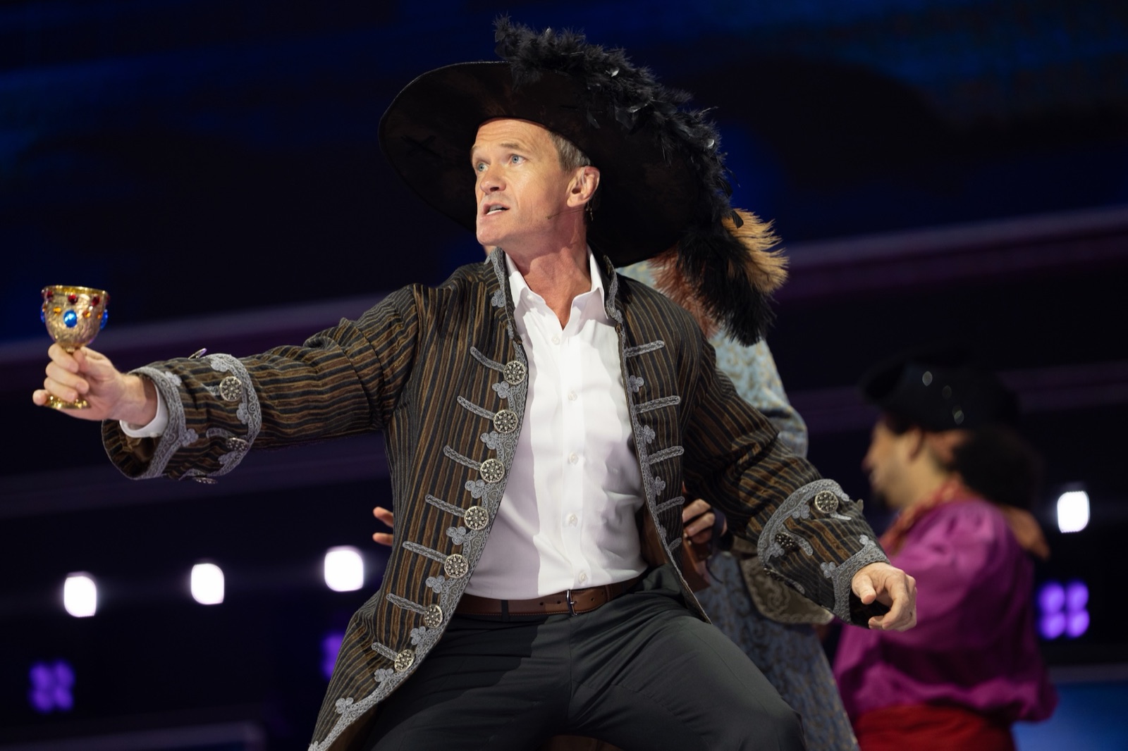 Neil Patrick Harris performs in pirate costume during the D23 opening number