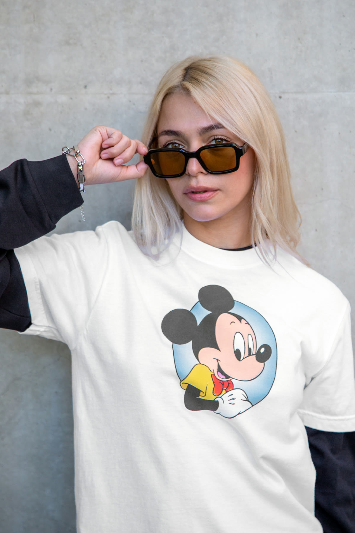 White Mickey Mouse shirt with a seated Mickey illustration