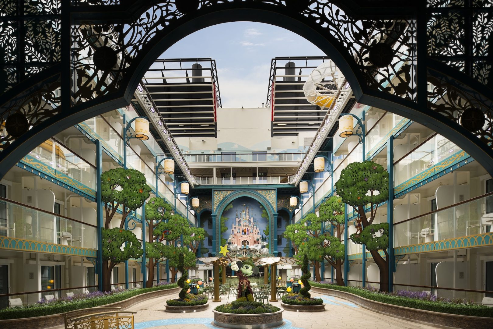 Disney Cruise Line character greeting guests in the Disney Adventure atrium