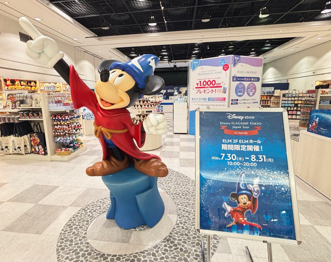 Mickey Mouse statue beside Disney Flagship Tokyo Japan Tour Aomori event signs