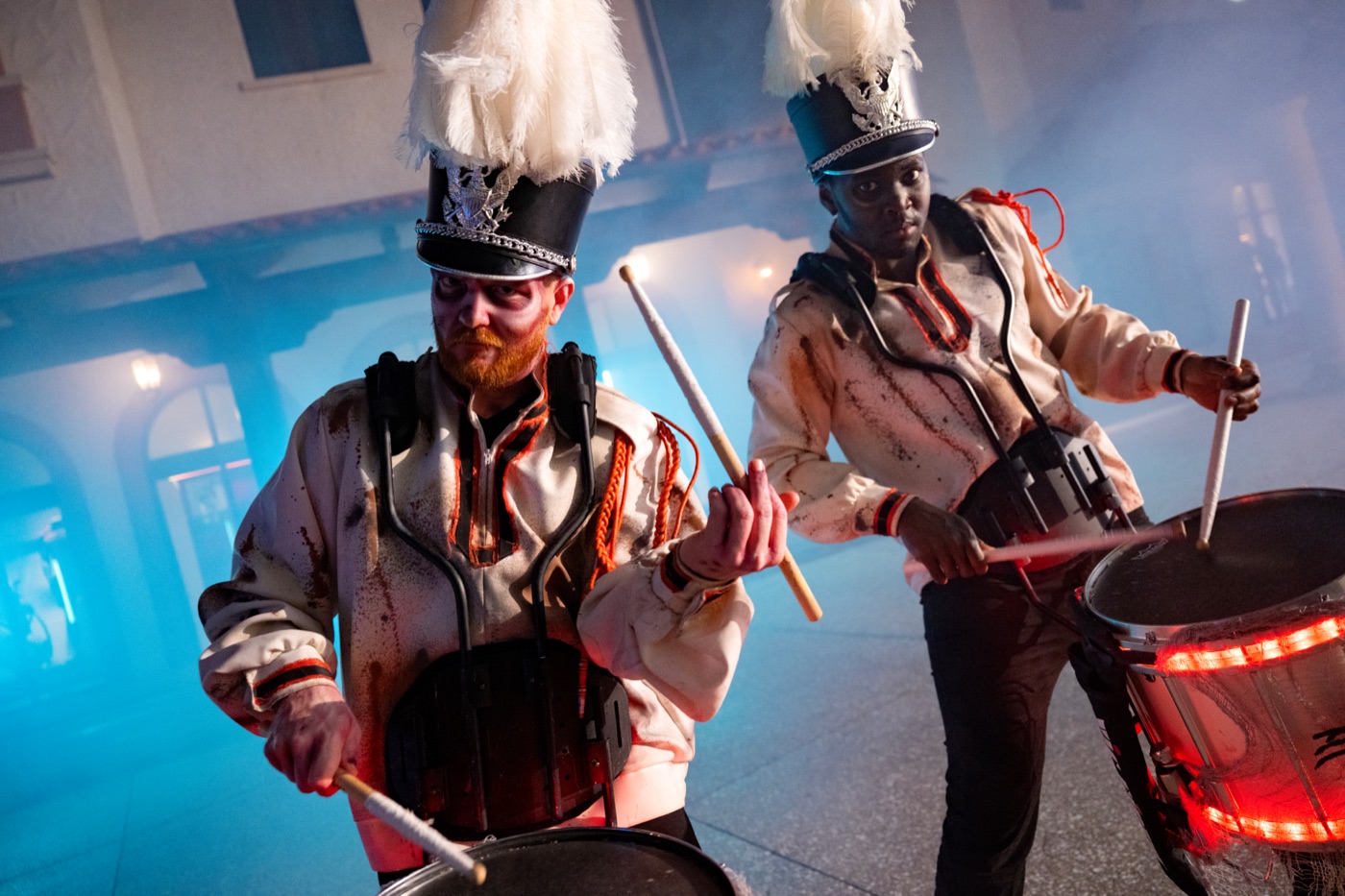 Fall drummers and stilt walkers perform at Disney Springs