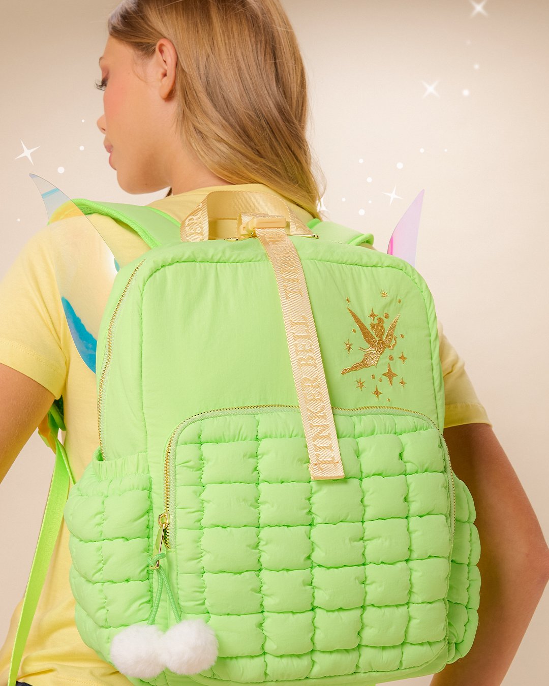 Bright green quilted Tinker Bell backpack with gold details