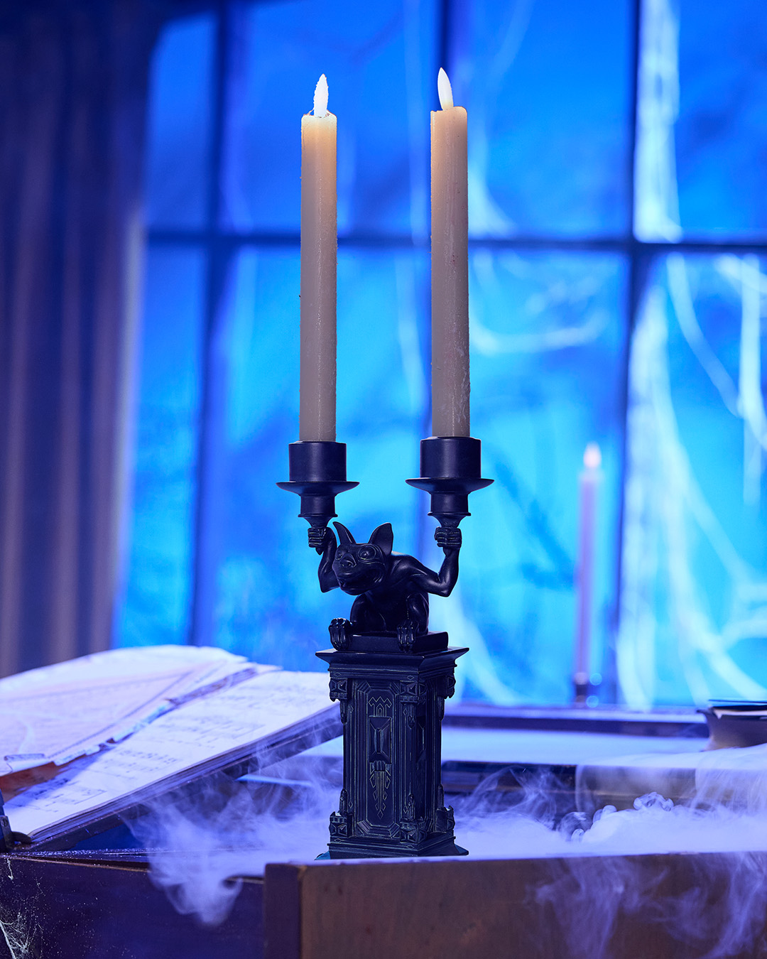 Haunted Mansion gargoyle candleholder holding two candles