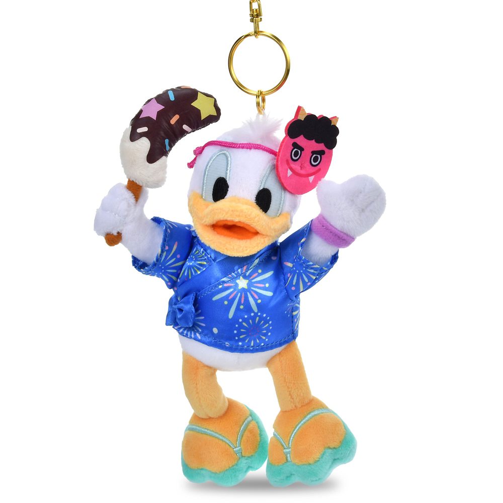 Donald Duck plush keychain in a blue fireworks matsuri outfit holding a chocolate banana
