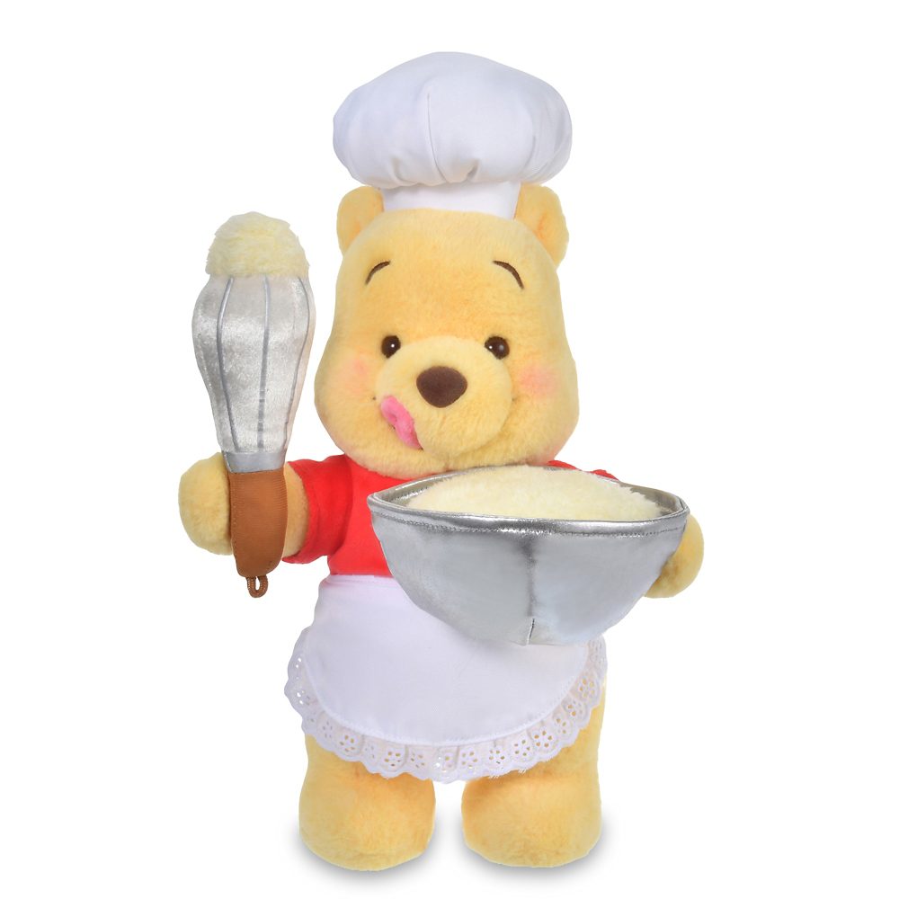 Pooh chef plush holding a bowl and whisk