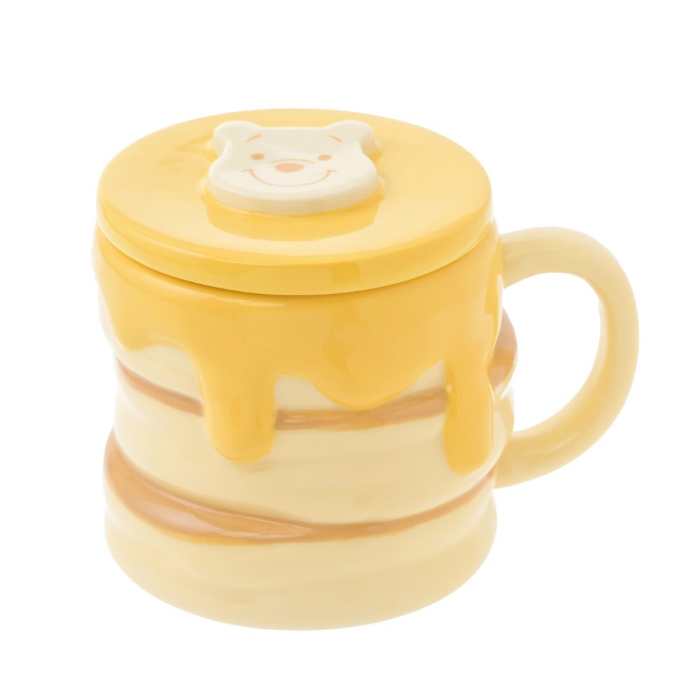 Pooh lidded mug with honey-yellow accents