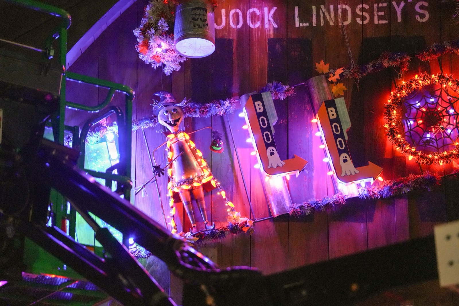 Halloween decorations and illuminated signs at Jock Lindsey’s Hangar Bar