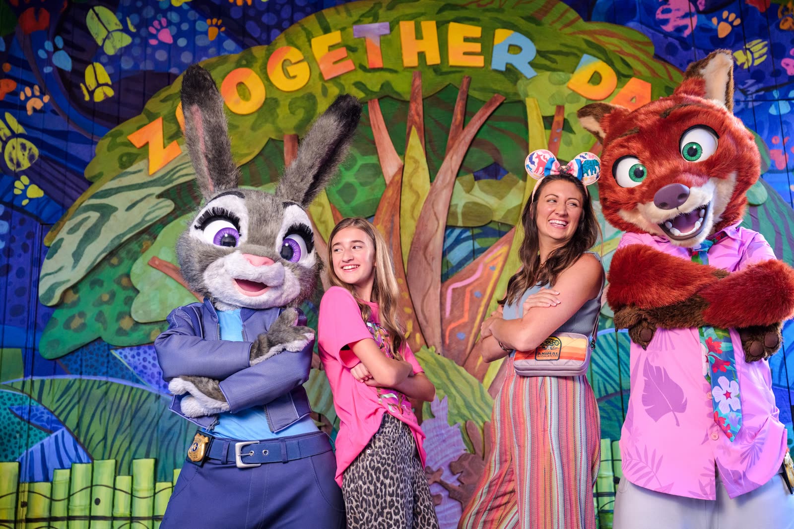 Guests pose with Judy Hopps and Nick Wilde at Walt Disney World