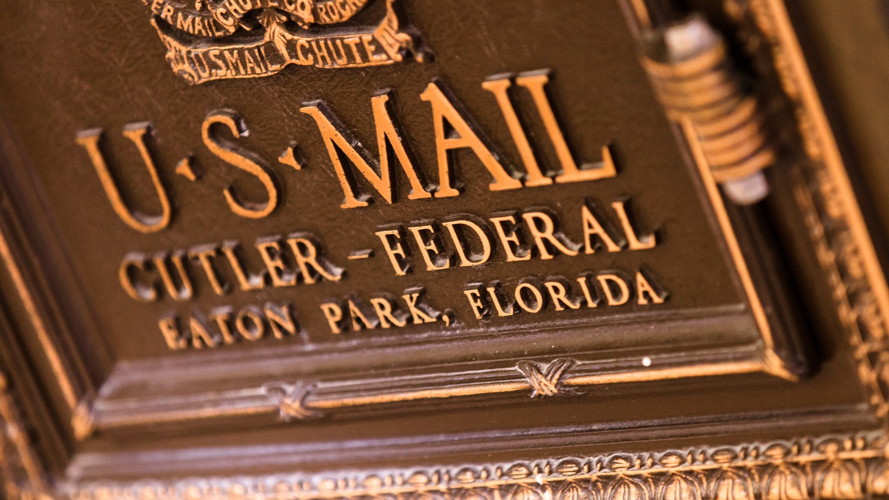 A bronze United States mail chute at Disney’s All-Star Movies Resort