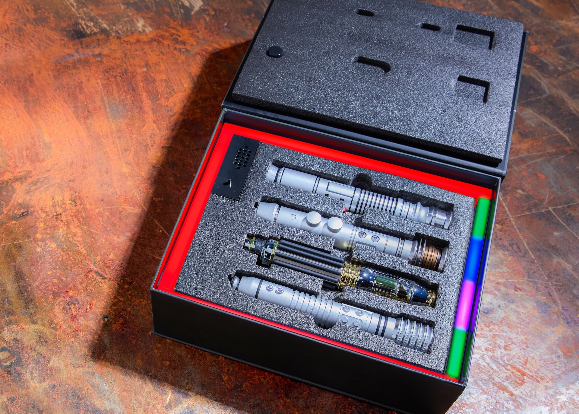Arresting the Chancellor Legacy Lightsaber Hilt Set open in its display box