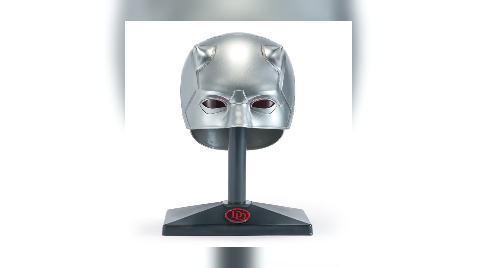 Silver Daredevil mask on its display stand