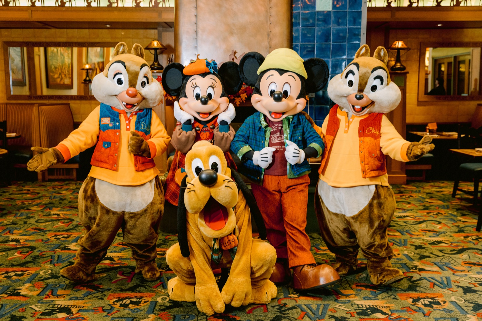 Mickey and friends in autumn attire at Storytellers Cafe