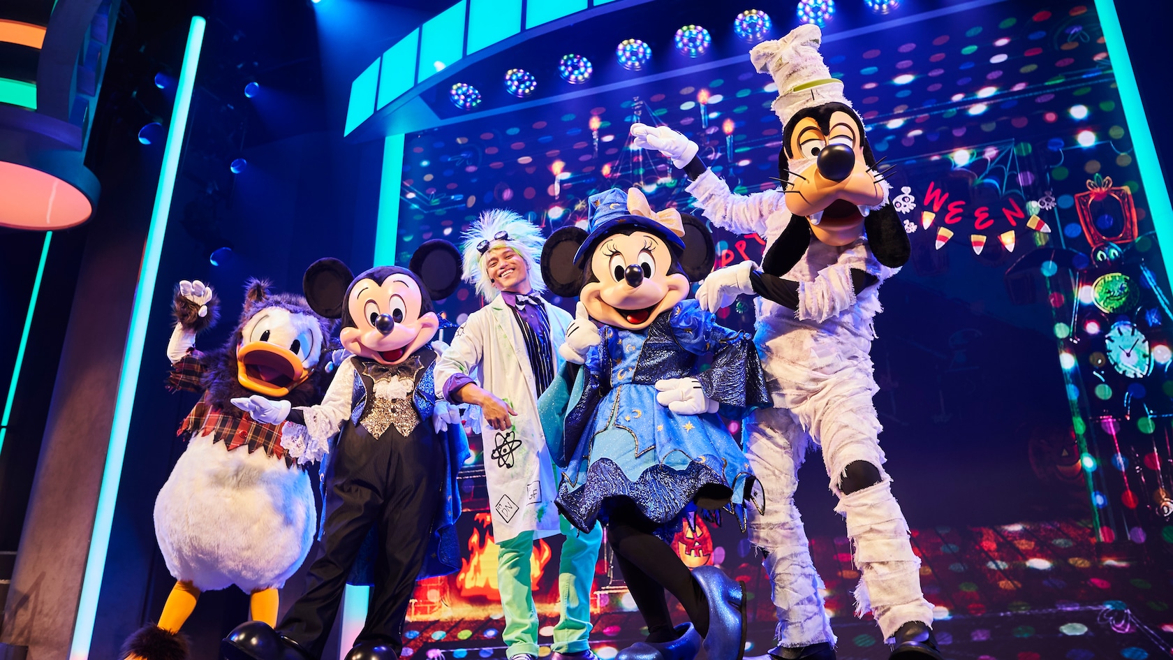 Mickey, Minnie, Donald and Goofy perform in Mickey's Trick and Treat at Disney California Adventure