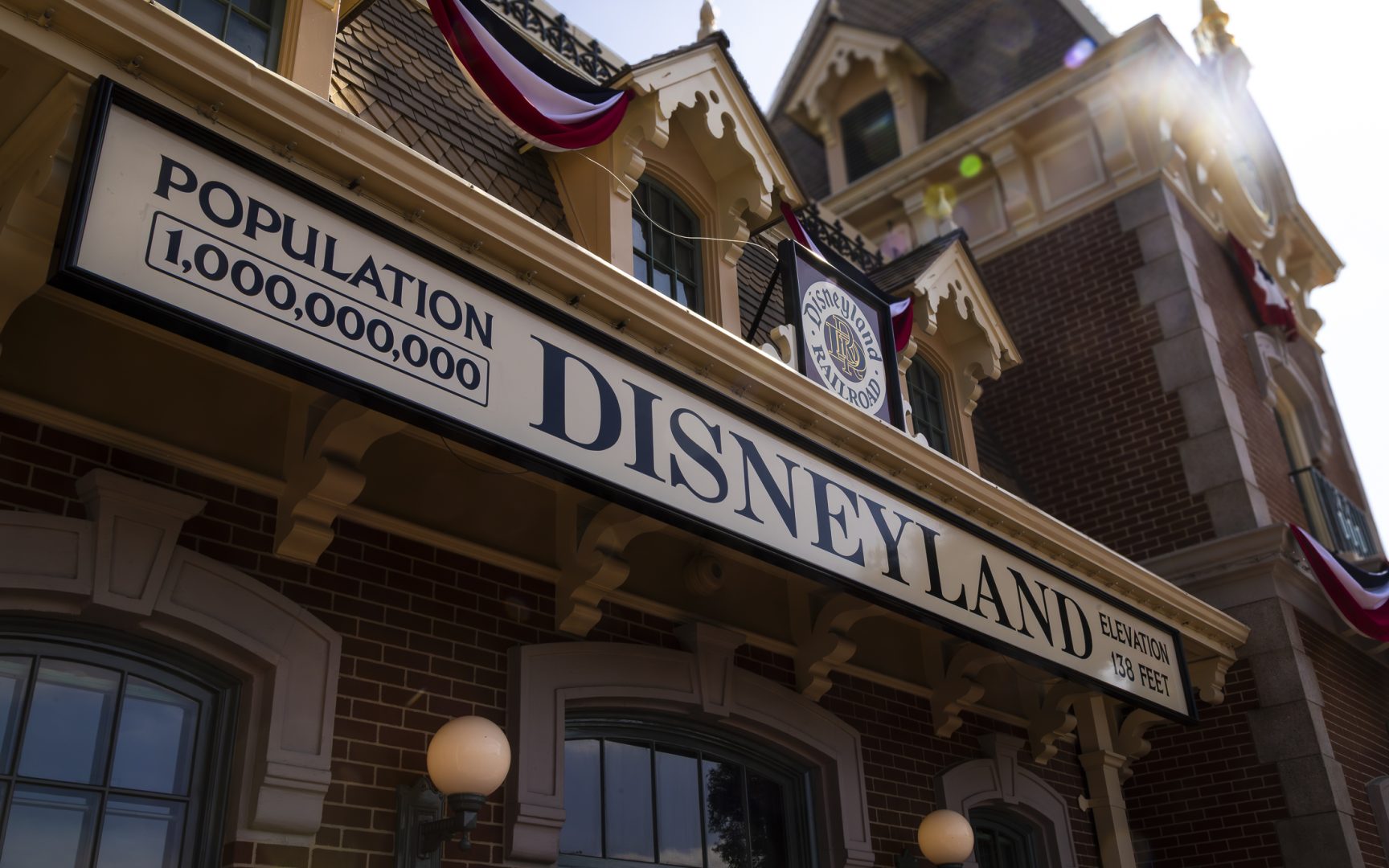 Disneyland train station population sign showing 1,000,000,000