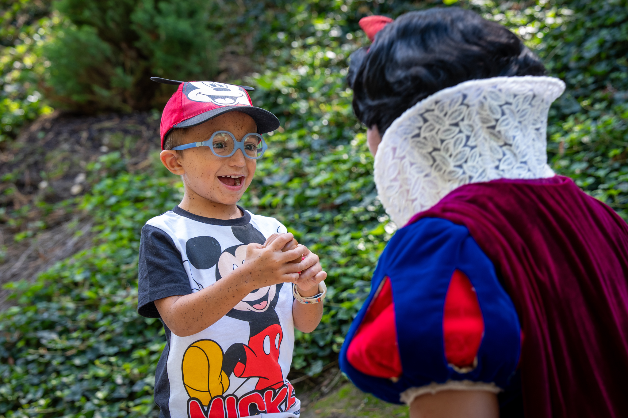 A child meets a Disney character during the Disneyland Paris stay