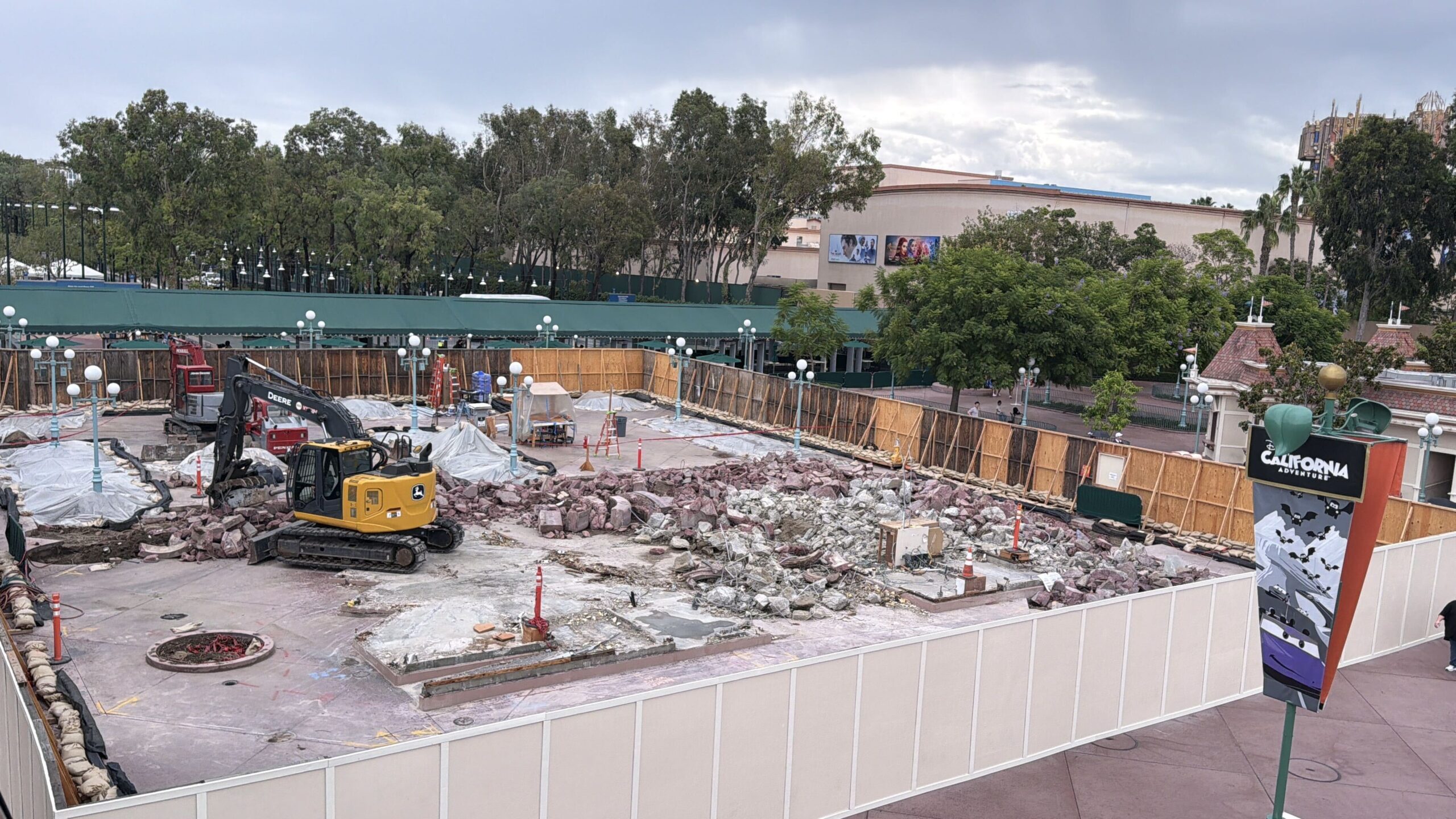 Demolished eastern Disneyland Esplanade ticket booth area with rubble and construction equipment