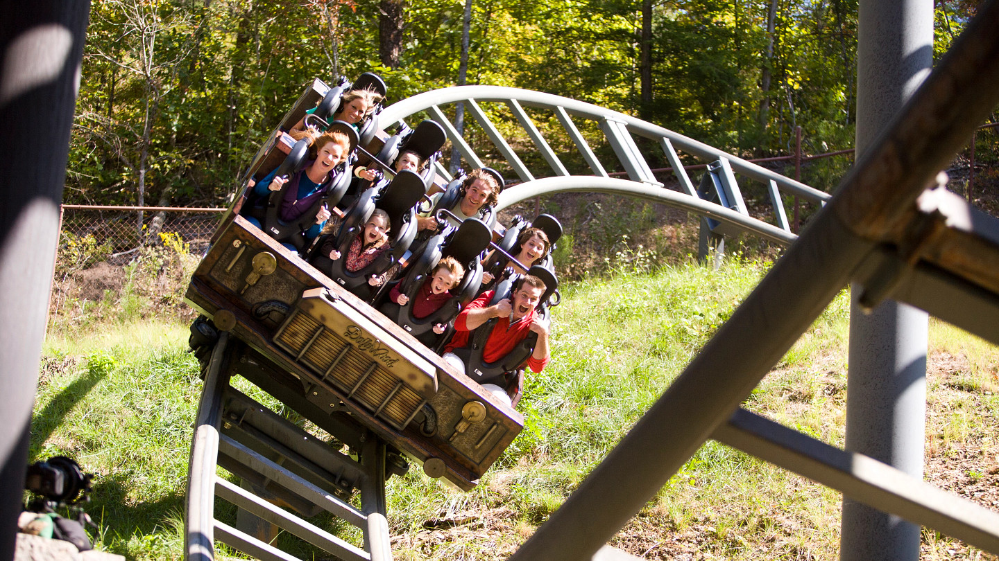 Guests riding Mystery Mine at Dollywood