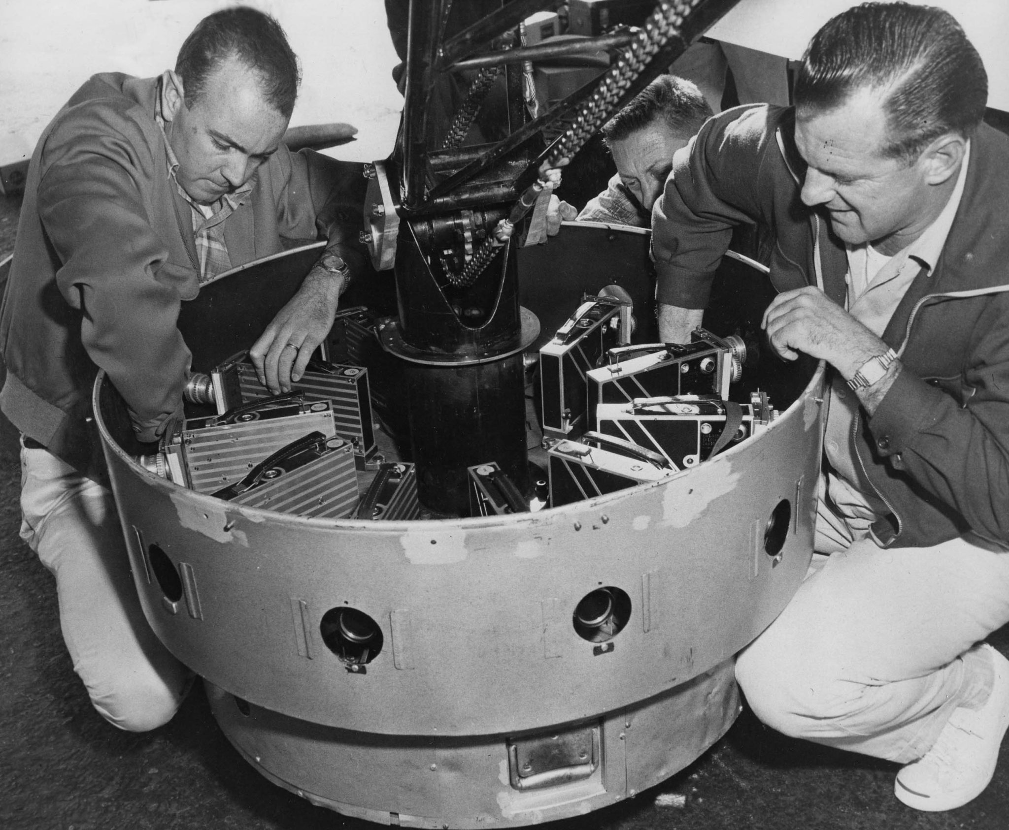 Don Iwerks and other technicians working on a Circle-Vision camera rig