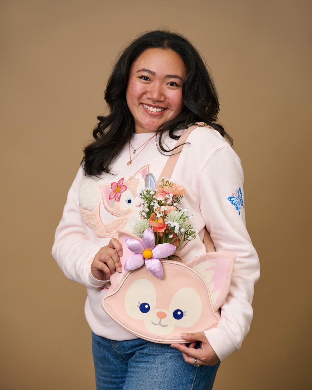 LinaBell sweatshirt and character-face bag in the Duffy and Friends Mickey's of Glendale preview