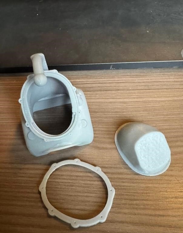 White prototype water ride vehicle model in three pieces