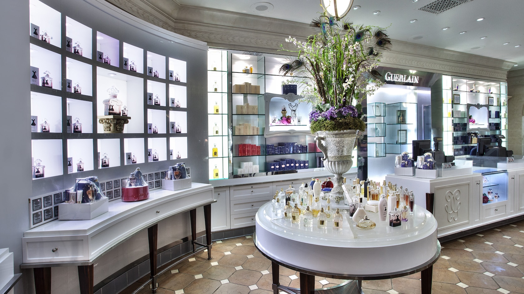 Guerlain displays and fragrance shelves inside La Signature at EPCOT