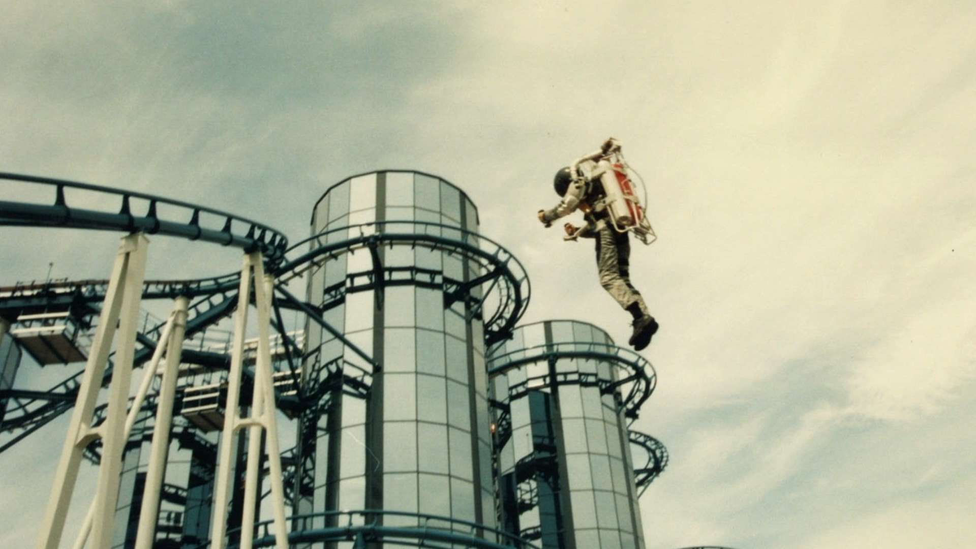 A performer in a silver space suit at Euro-Mir's opening