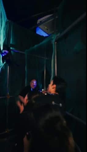 Halloween Horror Nights 14 teaser thumbnail with a shadowed figure