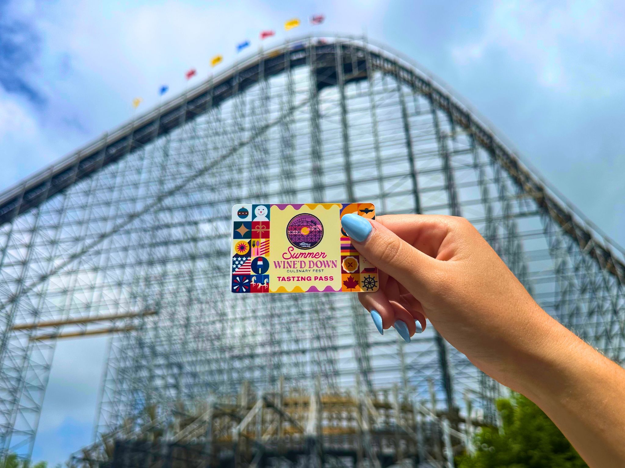 Summer Wine'd Down tasting pass held in front of The Voyage at Holiday World