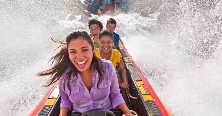 Riders splash down Dudley Do-Right's Ripsaw Falls at Islands of Adventure