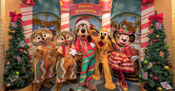 Goofy and Disney friends in holiday outfits at Goofy's Kitchen