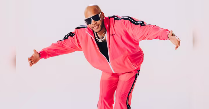 Flo Rida wearing a bright pink tracksuit in an official Busch Gardens Williamsburg concert image