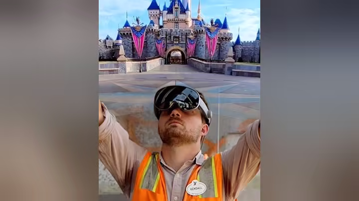 We Call It Imagineering Disney Parkitecture image with an Imagineer in front of Cinderella Castle