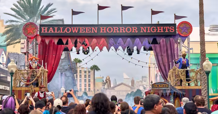 Halloween Horror Nights entrance at Universal Studios Florida with performers and guests