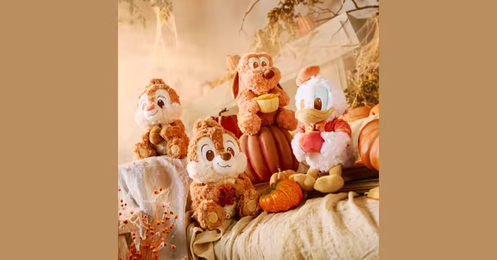 Fall Vibes character plush in an autumn display