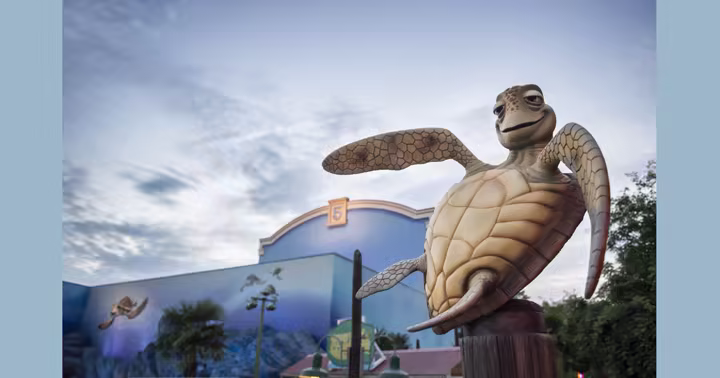 Crush statue outside Crush’s Coaster at Disney Adventure World in Disneyland Paris