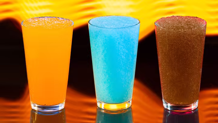 Blue raspberry, Coca-Cola and Fanta Orange slushies from Astrofizz at Magic Kingdom