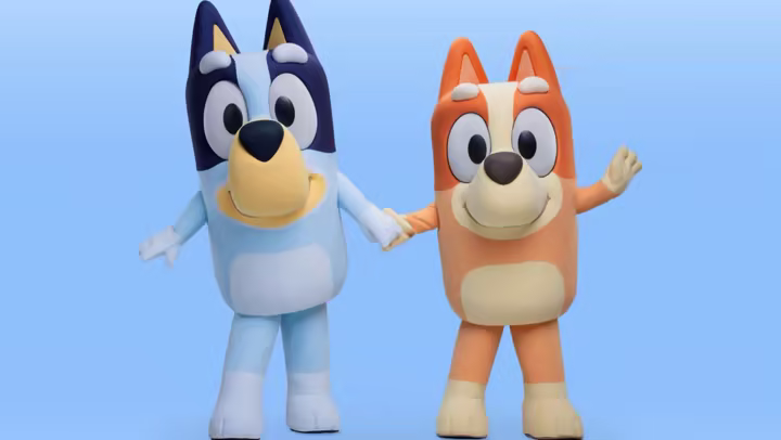 Bluey and Bingo standing together for Walt Disney World's Cool KIDS' SUMMER