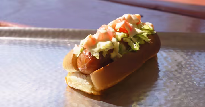 Cedar Point's bacon-wrapped BLT Dog with lettuce and tomato