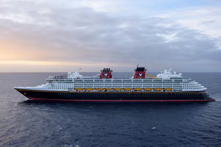 Disney Wonder sails at sea in an official Disney Cruise Line image