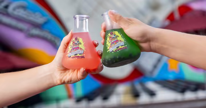 Pink and green drinks in Muppets lab flask novelty cups at Disney's Hollywood Studios