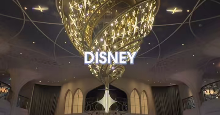 The Disney Wish Grand Hall chandelier above the theater