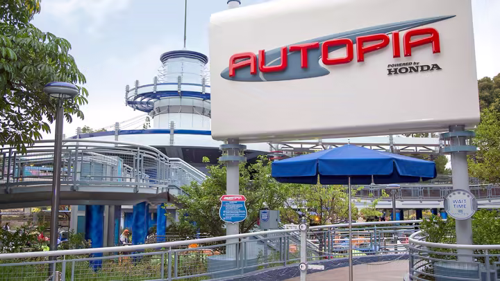 Guests drive Autopia cars at Disneyland Park