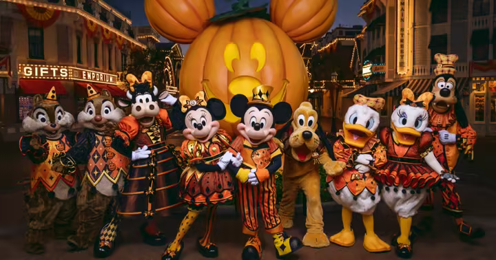 Disney characters in new Halloween costumes on Main Street at Disneyland