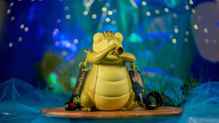 Louis Sipper with trumpet and Disney Parks strap for Disneyland Park