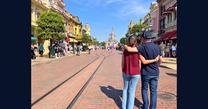 Anne-Lise returns to Main Street, U.S.A. at Disneyland Paris with Sleeping Beauty Castle in the distance